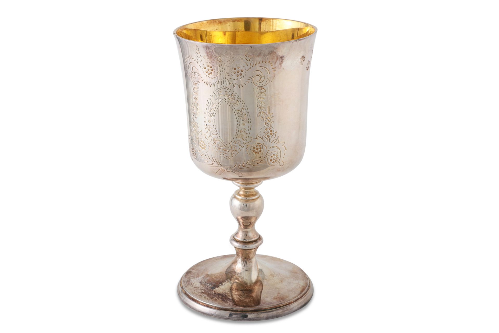 A LATE 20TH CENTURY IRISH SILVER GILT CHALICE/GOBLET, with engraved decoration, raised over a