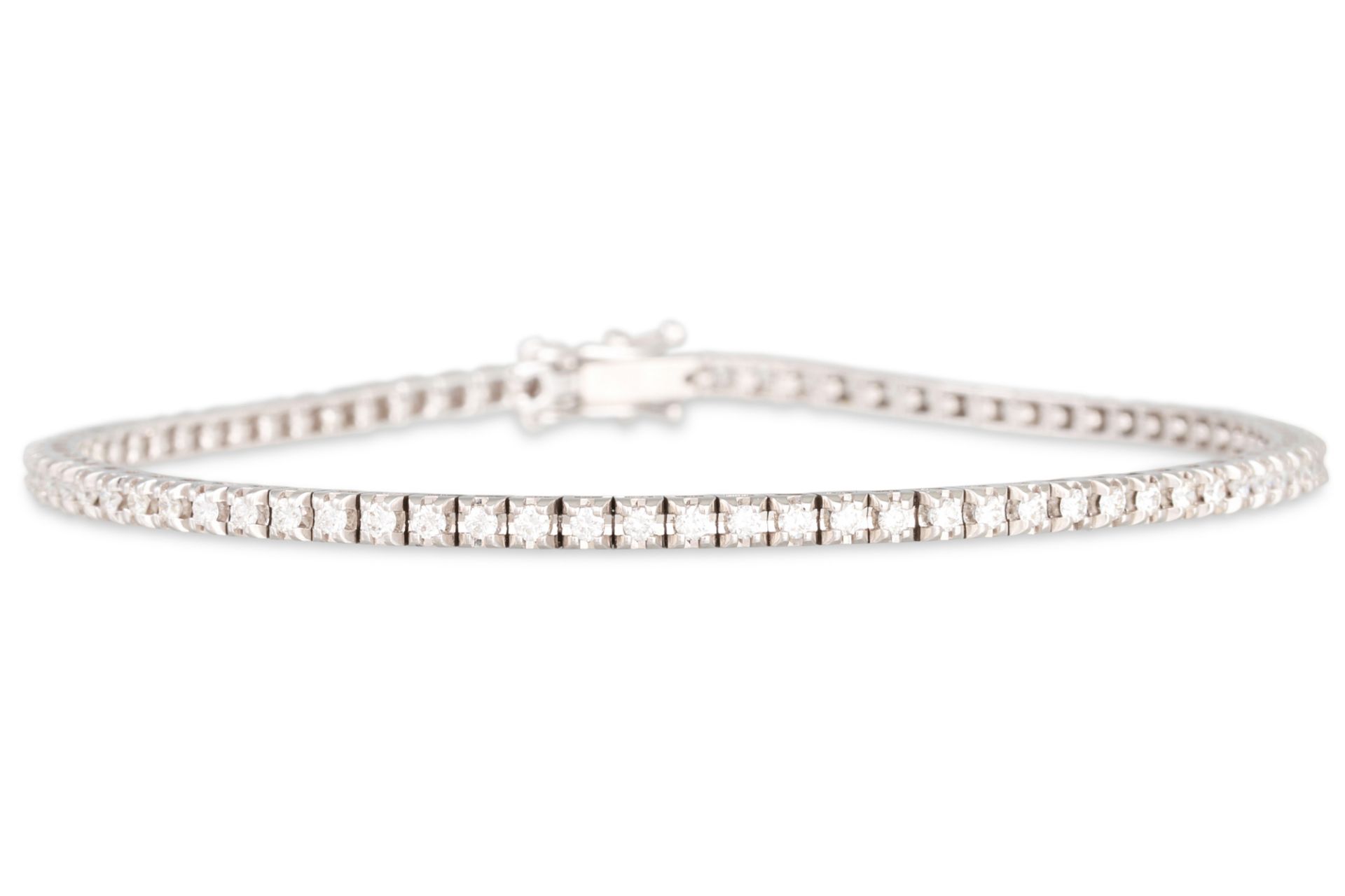 A DIAMOND LINE BRACELET, mounted in 18ct white gold. Together with a HRD Cert stating the diamonds