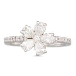 A DIAMOND FLOWER CLUSTER RING, the brilliant cut and pear cut diamonds mounted in 18ct white gold.