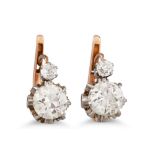 A PAIR OF ANTIQUE DIAMOND CLUSTER EARRINGS, the old cut diamonds mounted in yellow gold.