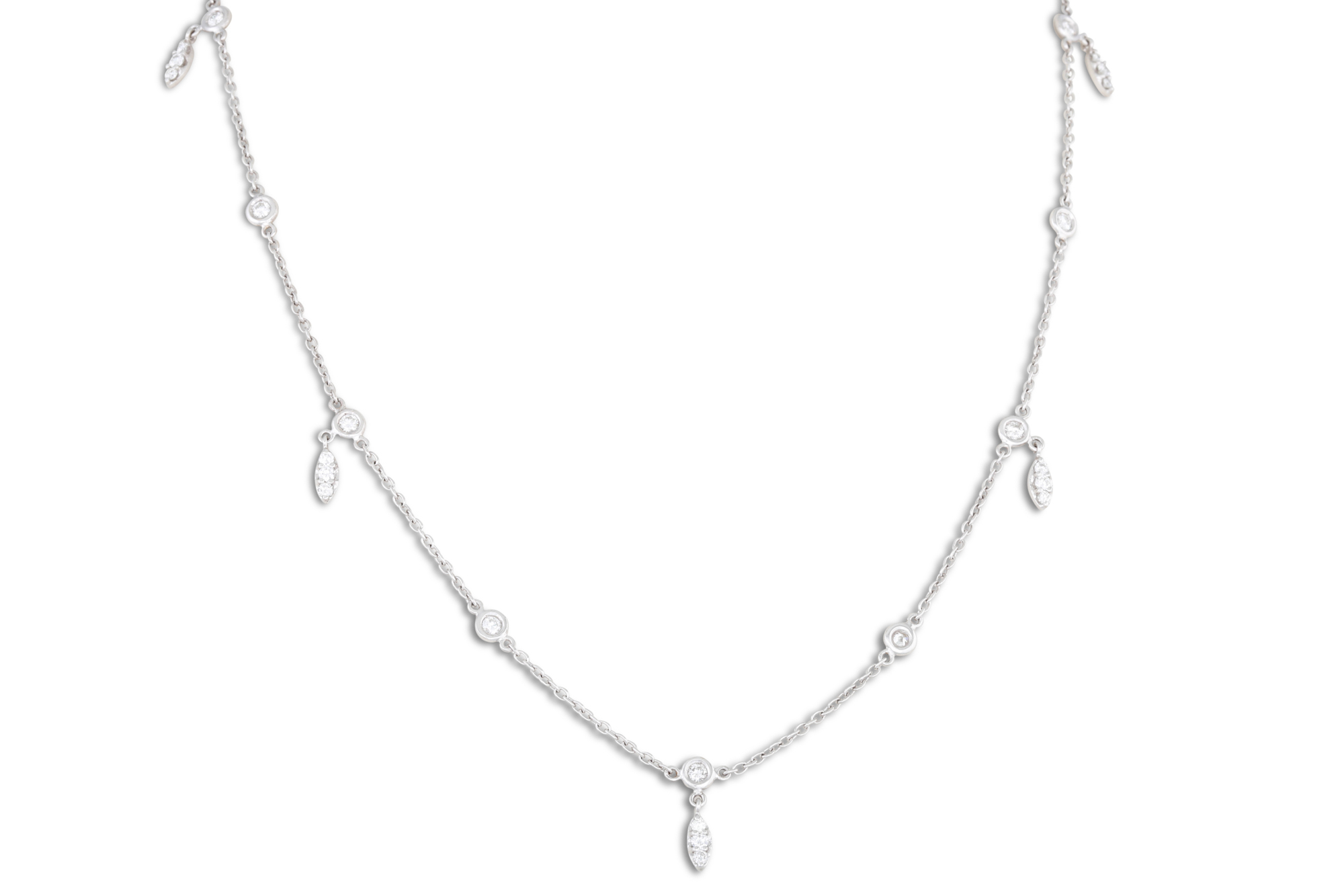A DIAMOND SET CHAIN, the collet set diamond linked by 18ct white chain, suspending further diamonds.