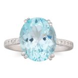 A TOPAZ AND DIAMOND RING, the oval topaz to diamond shoulders, mounted in white gold, size M - N