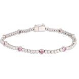 A PINK SAPPHIRE AND DIAMOND LINE BRACELET, mounted in 18ct white gold. Estimated: weight of