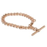 AN ANTIQUE 9CT GOLD ALBERT BRACELET, with T-bar, 28.2 g.