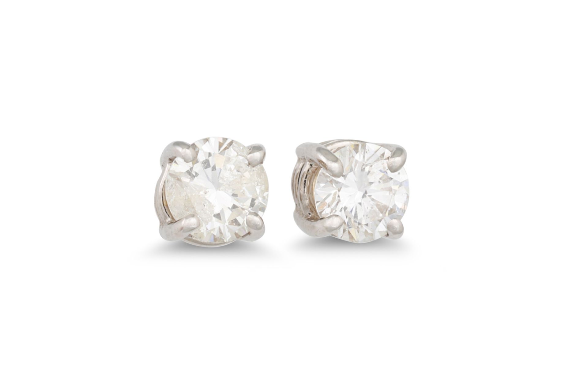 A PAIR OF DIAMOND STUD EARRINGS, mounted in white gold. Estimated: weight of diamonds: 0.40 ct.