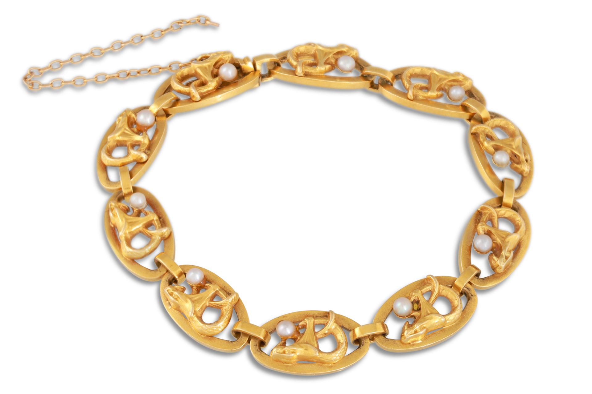 AN ART NOUVEAU PEARL AND GOLD BRACELET, each abstract oval panel set with a pearl, in 18ct gold,