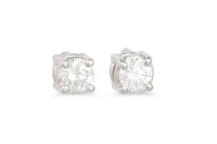 A PAIR OF DIAMOND STUD EARRINGS, the brilliant cut diamonds mounted in 18ct white gold. Estimated;