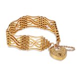 A 9CT GOLD GATE BRACELET, with padlock, engraved decoration, 23 g.