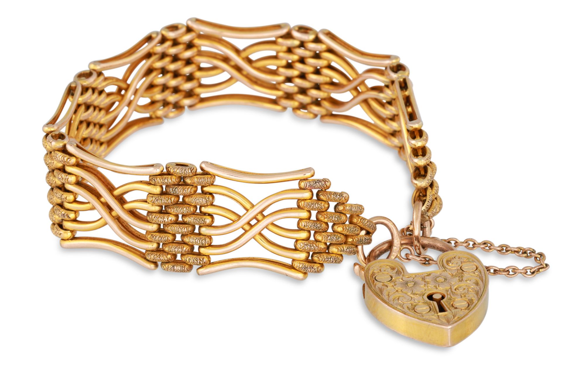 A 9CT GOLD GATE BRACELET, with padlock, engraved decoration, 23 g.