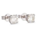 A PAIR OF DIAMOND STUD EARRINGS, the brilliant cut diamonds mounted in 18ct white gold. Together