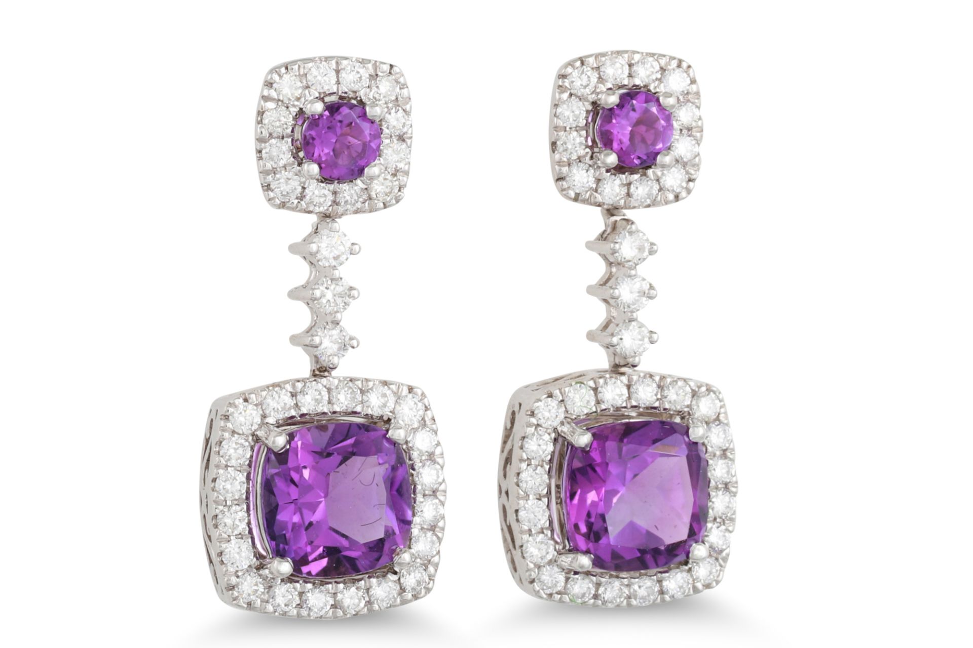 A PAIR OF DIAMOND AND AMETHYST DROP EARRINGS, the mixed cut amethyst to diamond surround, detachable