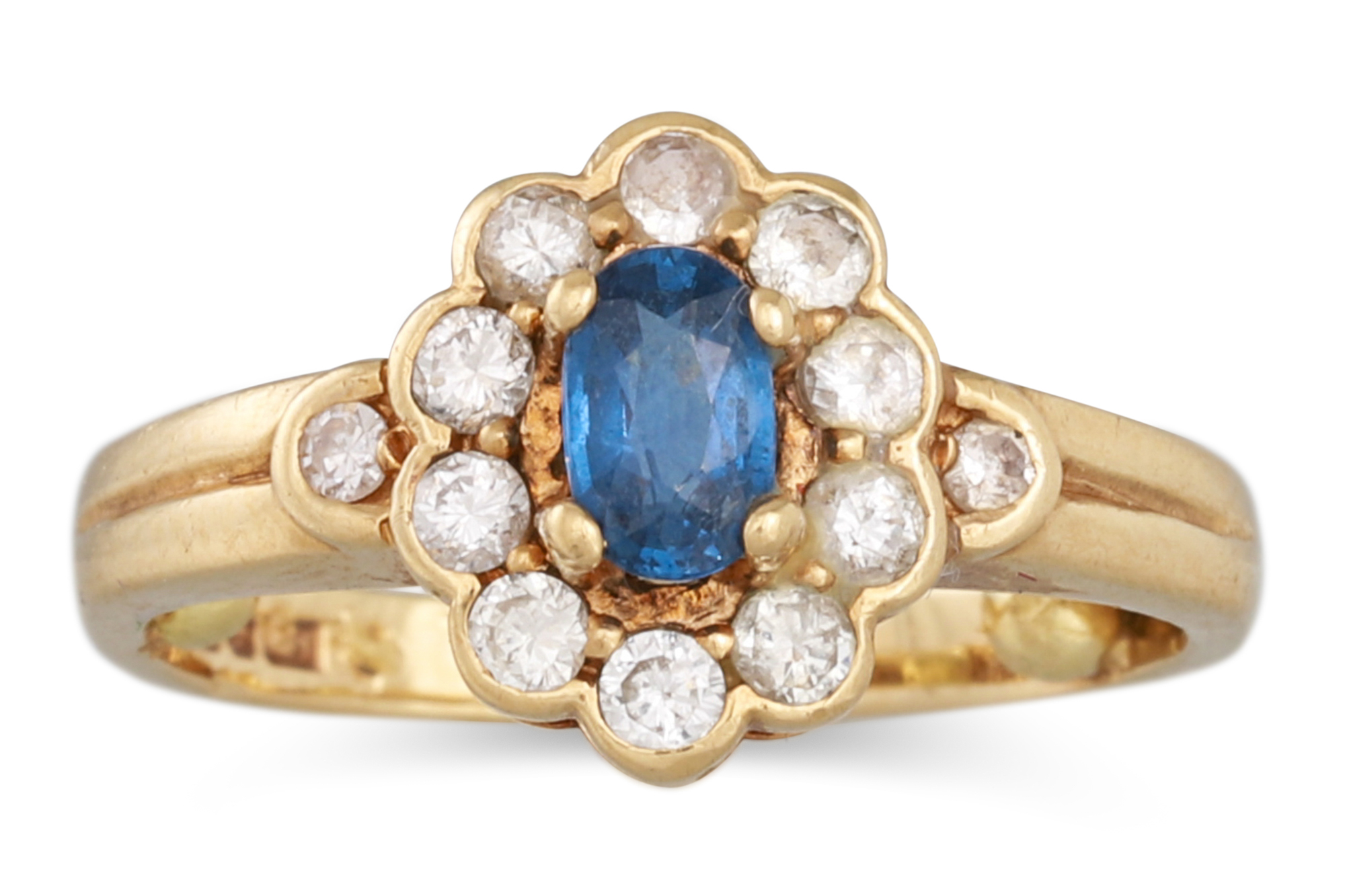 A VINTAGE SAPPHIRE AND DIAMOND CLUSTER RING, mounted in 9ct gold. Size: C