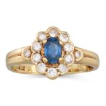 A VINTAGE SAPPHIRE AND DIAMOND CLUSTER RING, mounted in 9ct gold. Size: C