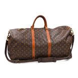 A VINTAGE LOUIS VUITTON KEEP ALL CANVAS BAG, with top handle and shoulder strap