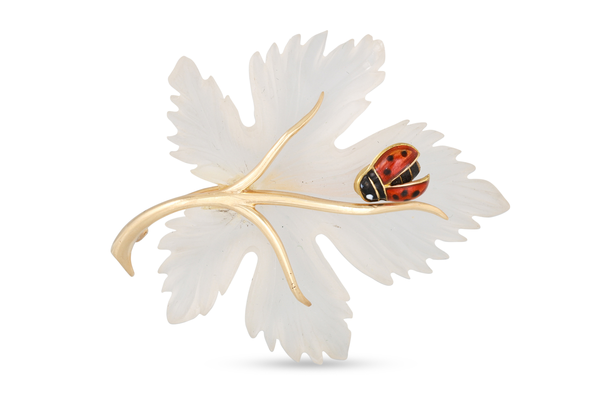 A CRYSTAL AND EMERALD BROOCH, modelled as a maple leaf with a lady bird, 14ct gold mounted