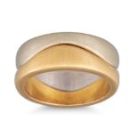 A PAIR OF CARTIER 18CT GOLD WAVE RINGS, one in white gold, the other in yellow, signed Cartier, size