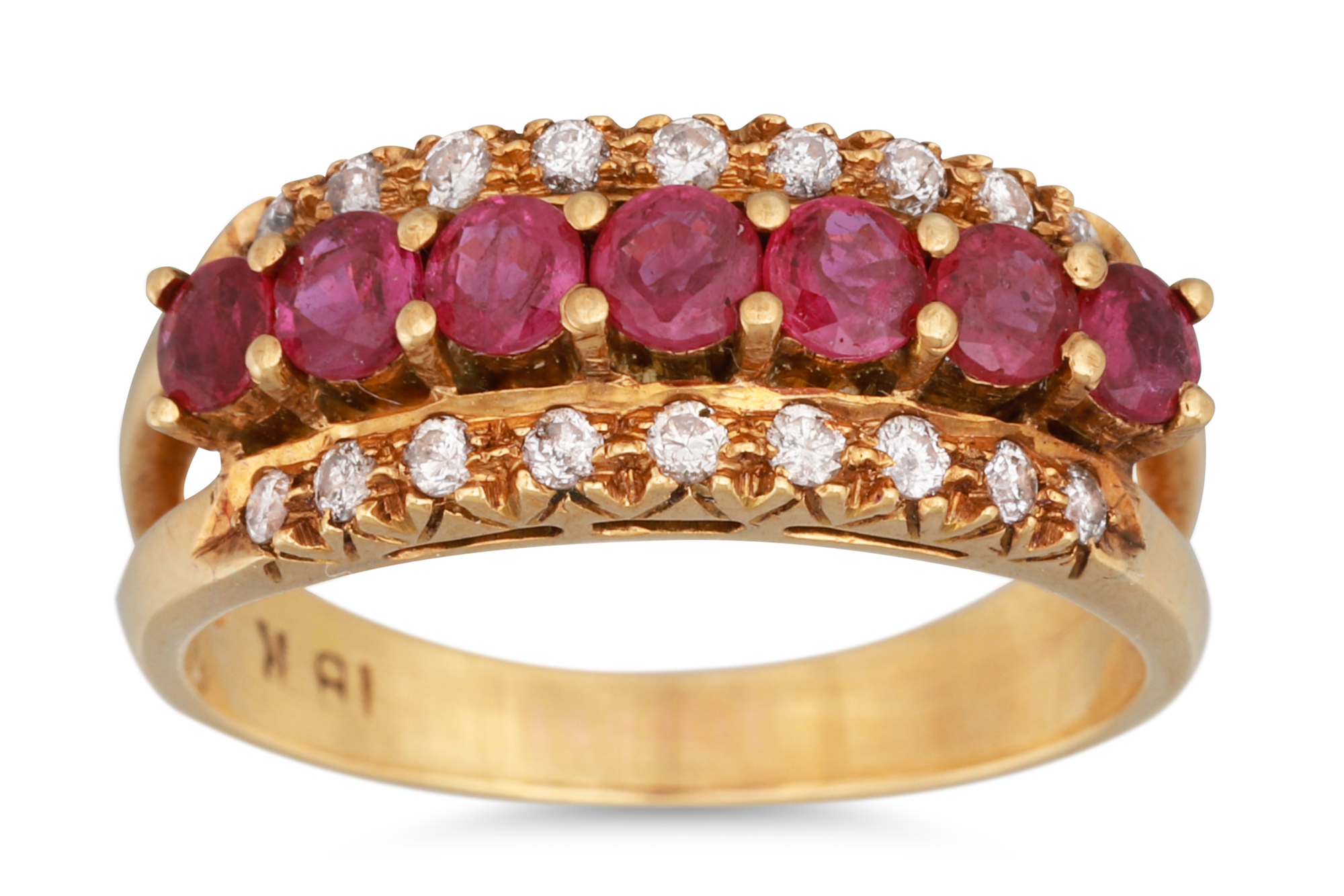 A VINTAGE DIAMOND AND RUBY DRESS RING, three rowed, ca 1960, mounted in 18ct gold. Size: N