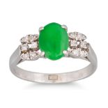 A JADE AND DIAMOND DRESS RING, mounted in 18ct white gold, ca 1960. Size: N