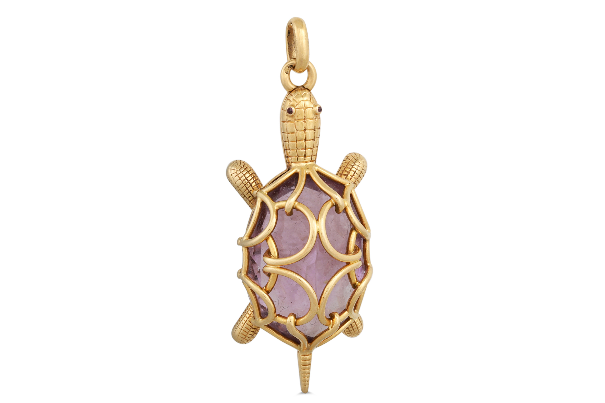 A CHAUMET TORTOISE PENDANT, in yellow gold, amethyst body and eyes, French assay mark for 18ct gold,