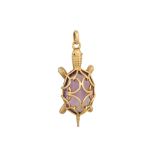 A CHAUMET TORTOISE PENDANT, in yellow gold, amethyst body and eyes, French assay mark for 18ct gold,