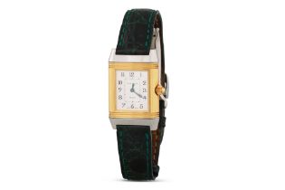 A LADY'S STAINLESS STEEL BI COLOUR JAEGER - LE COULTRE REVERSO WRISTWATCH, face I silvered with