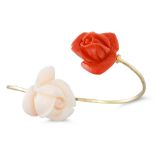 AN ITALIAN DESIGN CORAL AND GOLD BANGLE, of twist form, featuring carved coral roses