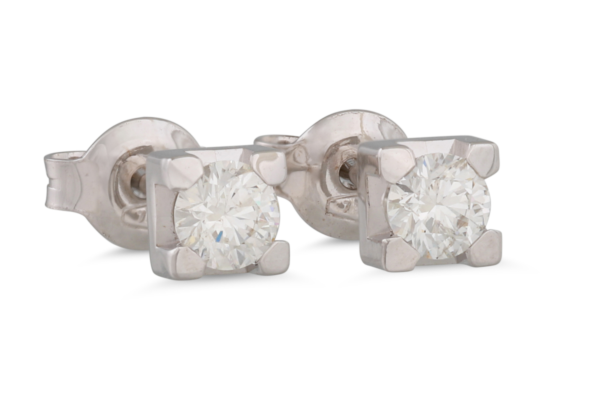 A PAIR OF DIAMOND STUD EARRINGS, the brilliant cut diamonds in square mounts, in 18ct white gold.