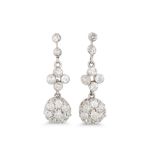 A PAIR OF DIAMOND DROP CLUSTER EARRINGS, the old cut diamonds mounted in white gold. Estimated: