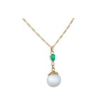 A SOUTH SEA PEARL AND COLOMBIAN EMERALD PENDANT, the pearl suspended from a pear shaped emerald,