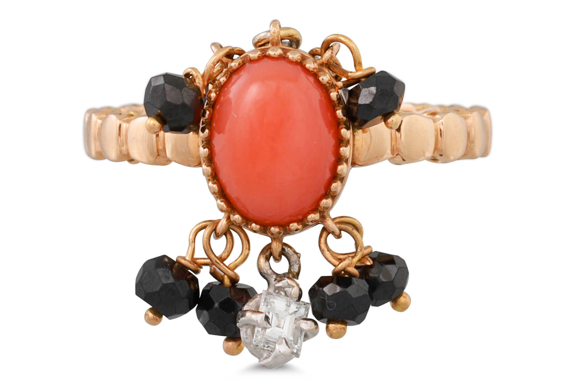 AN ITALIAN DESIGN CORAL, ONYX AND DIAMOND RING, set with an oval coral suspending onyx and diamonds,