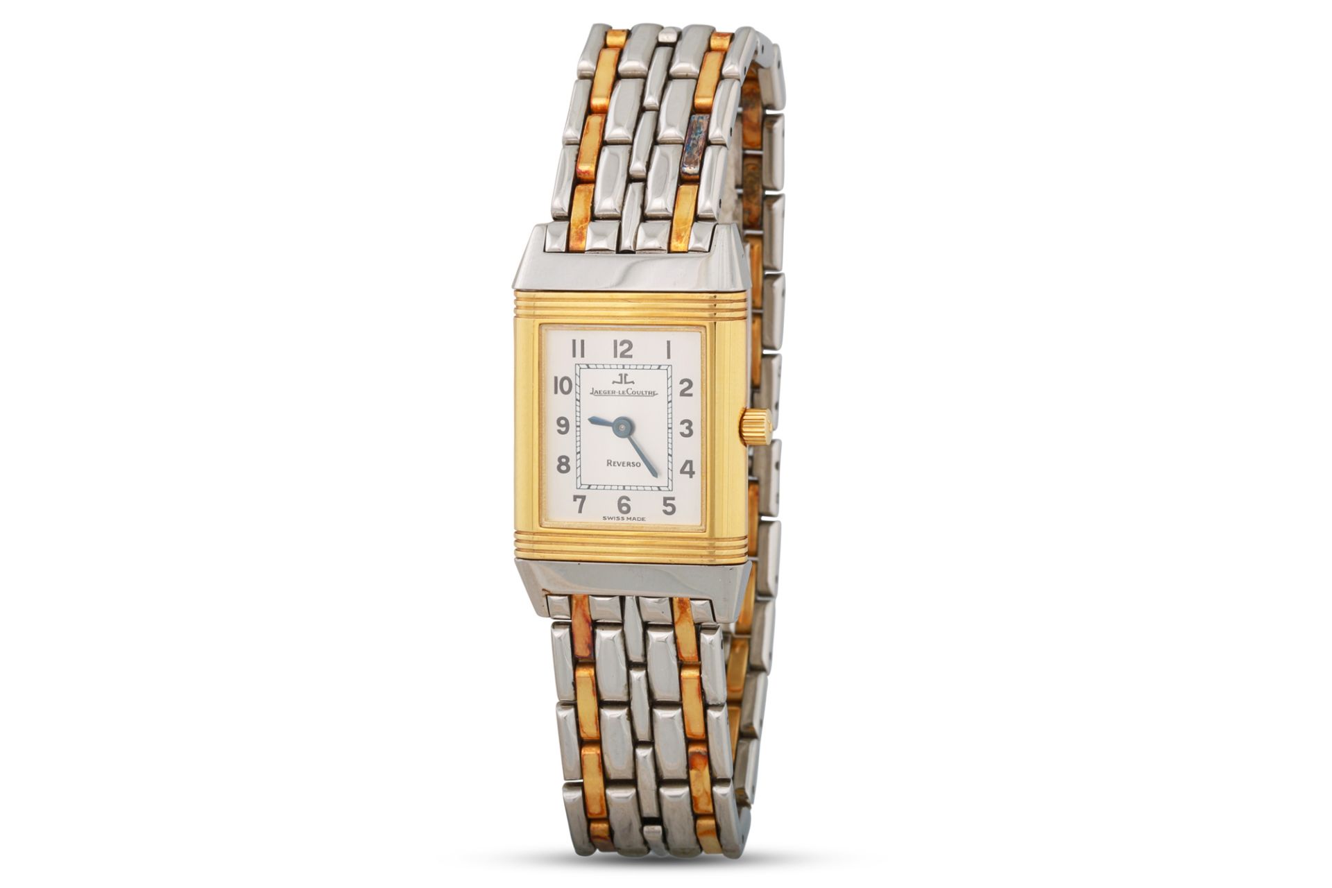 A LADY'S STAINLESS STEEL BI COLOUR JAEGER - LE COULTRE REVERSO WRISTWATCH, silvered face with Arabic