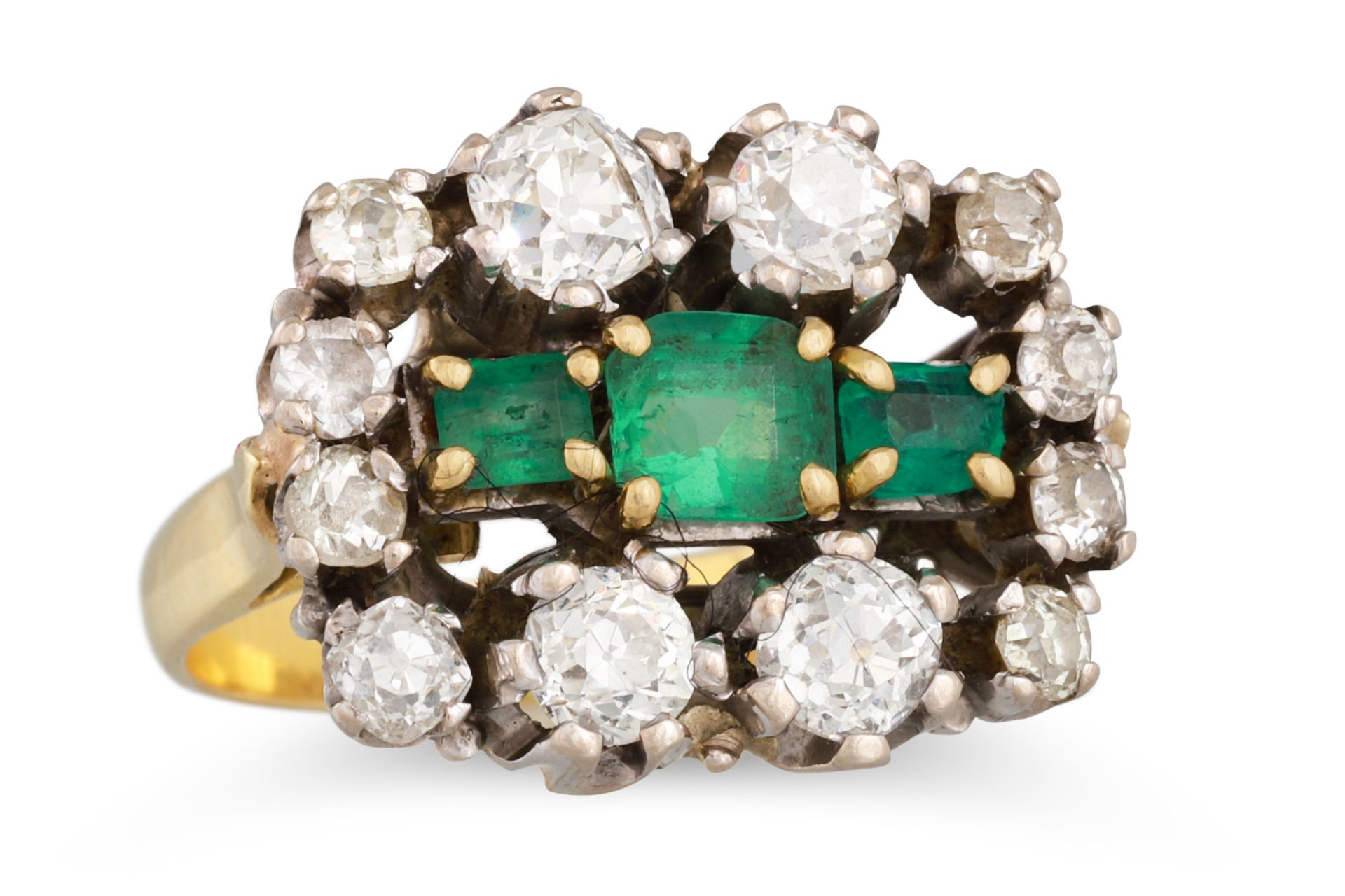 A VINTAGE EMERALD AND DIAMOND CLUSTER RING, the three central emeralds to a diamond surround,