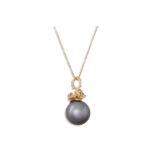 A TAHITIAN PEARL, BROWN DIAMOND AND GOLD PENDANT, on an 18ct gold chain