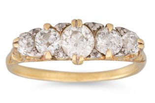 AN ANTIQUE FIVE STONE RING, the graduated old cut diamond in a 18ct yellow gold setting.