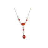 AN ANTIQUE CABOCHON CARNELIAN AND CUT CRYSTAL NECKLACE, drop form, in fitted West & Co. Dublin box