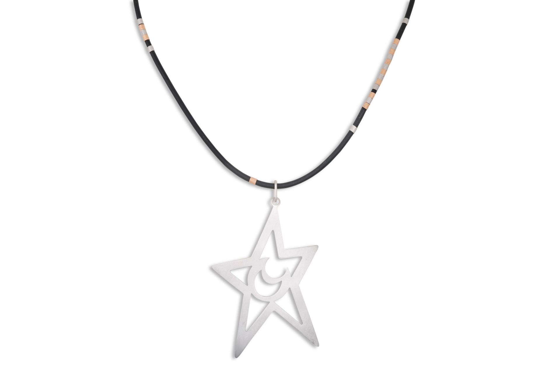 A MODERN STAR & CRESCENT PENDANT, mounted in 18ct white gold, on a black cord necklace to 18ct