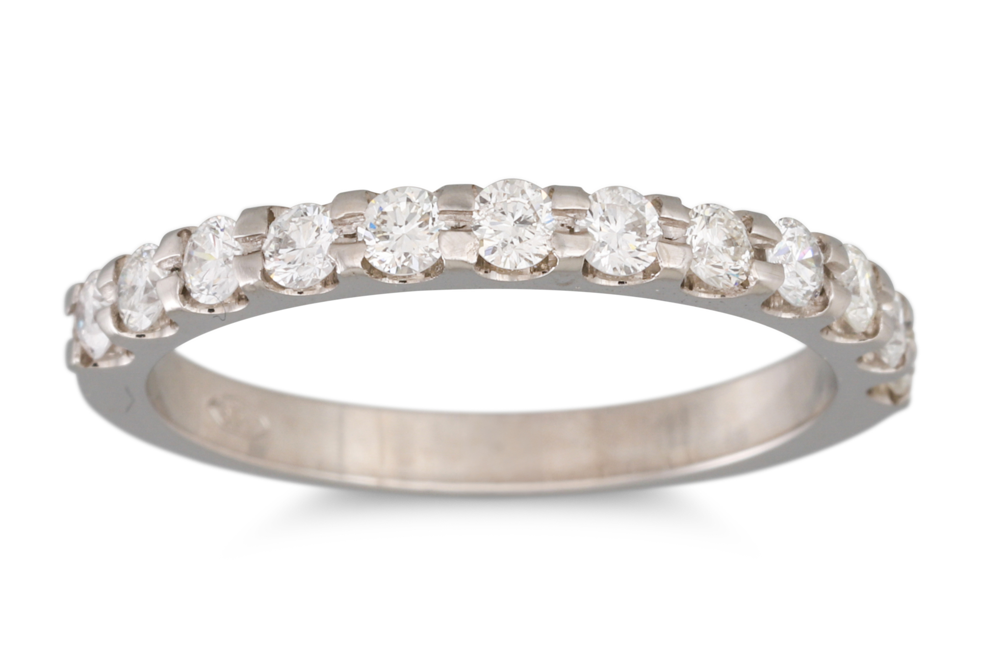 A DIAMOND HALF ETERNITY RING, the brilliant cut diamonds mounted in platinum. Estimated: weight of