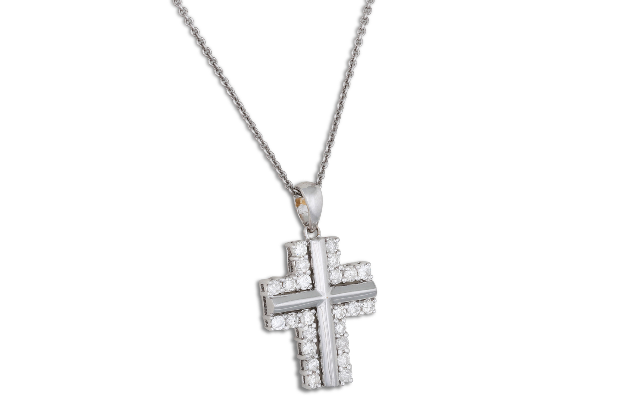 A DIAMOND SET CROSS, on a 9ct gold chain, mounted in 18ct white gold. Estimated: weight of diamonds: