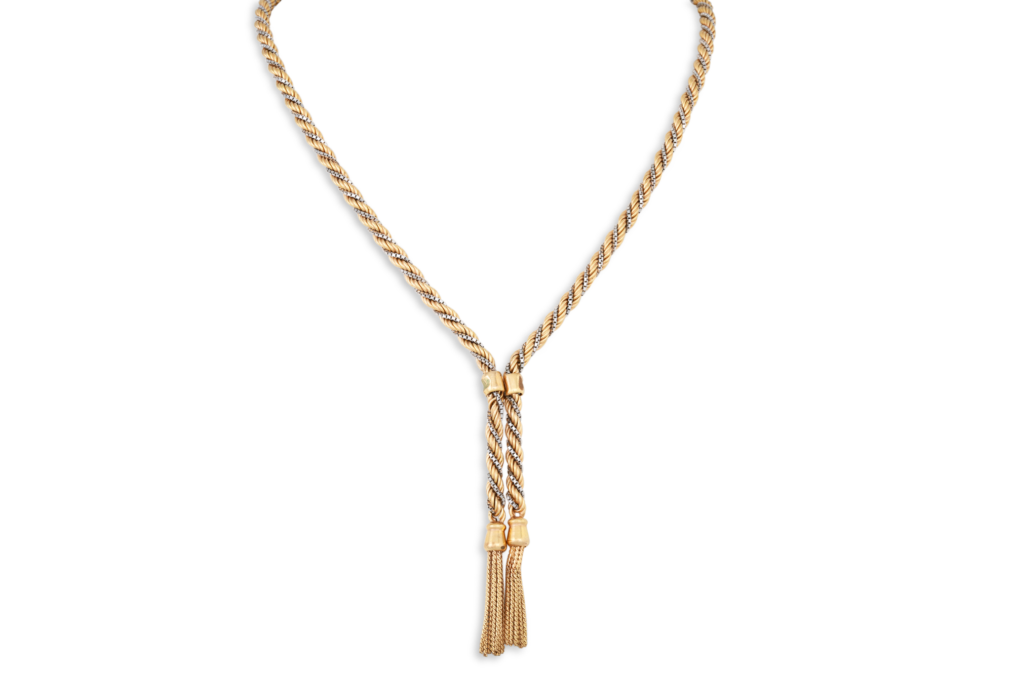 A 9CT GOLD TWO COLOUR ROPE NECKLACE, terminating in tassles, 22.6 g.
