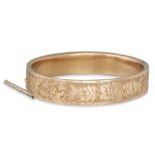A VICTORIAN ENGRAVED BANGLE, c.1880, in case by T.H. Richardson, Wexford, ca 1880