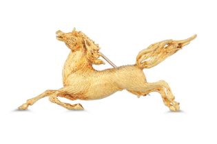 AN 18CT GOLD BROOCH, modelled as a horse, 8.3 g.