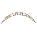 A DIAMOND SET CRESCENT BROOCH, mounted in gold. Estimated: weight of diamonds: 2.00 ct.