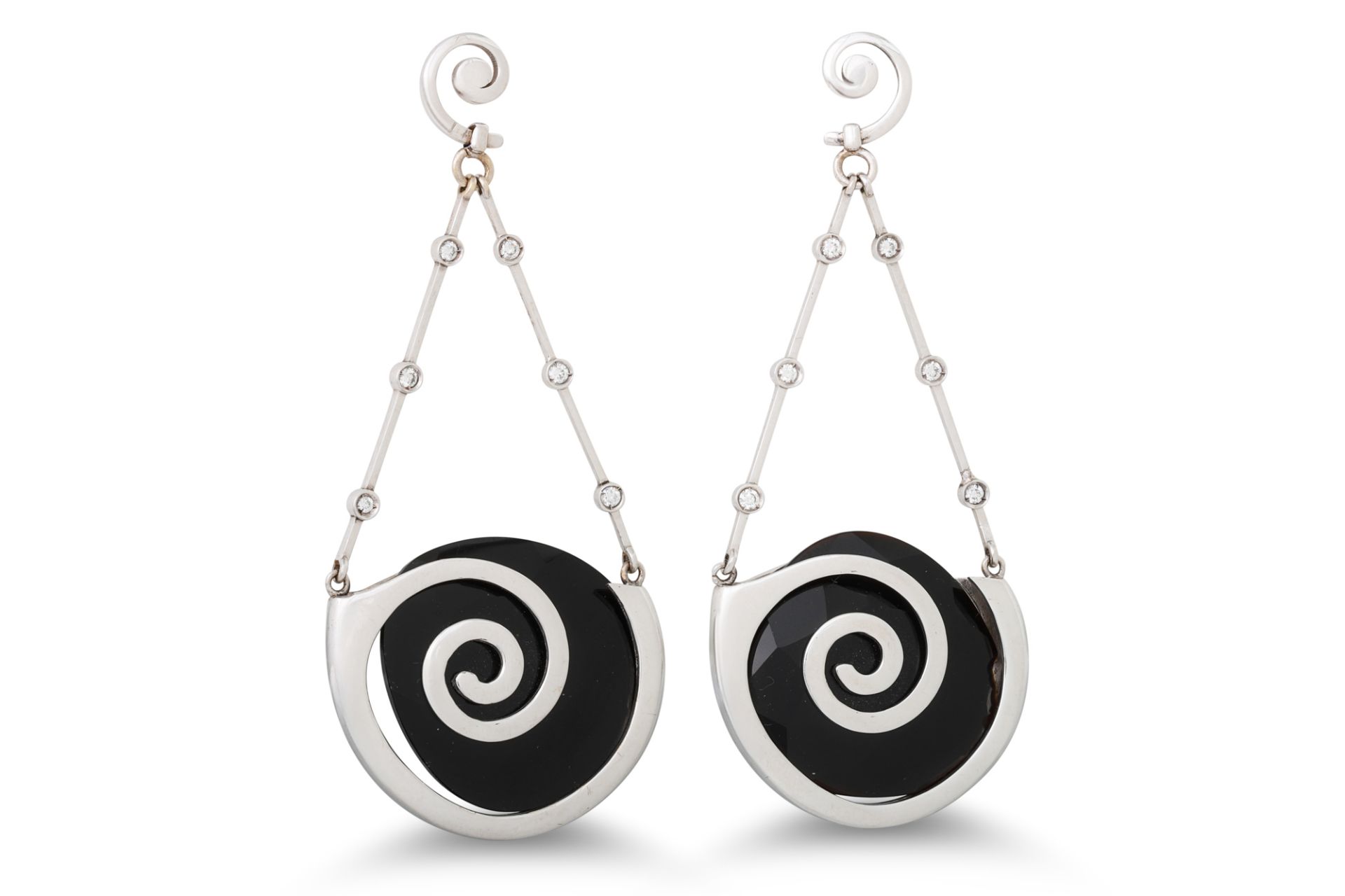 A PAIR OF ONYX AND DIAMOND DROP EARRINGS, of drop swirl design. Estimated: weight of diamonds: 0.