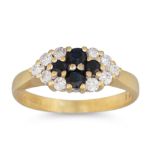 A SAPPHIRE AND DIAMOND CLUSTER RING, mounted in 18ct yellow gold, size L - M