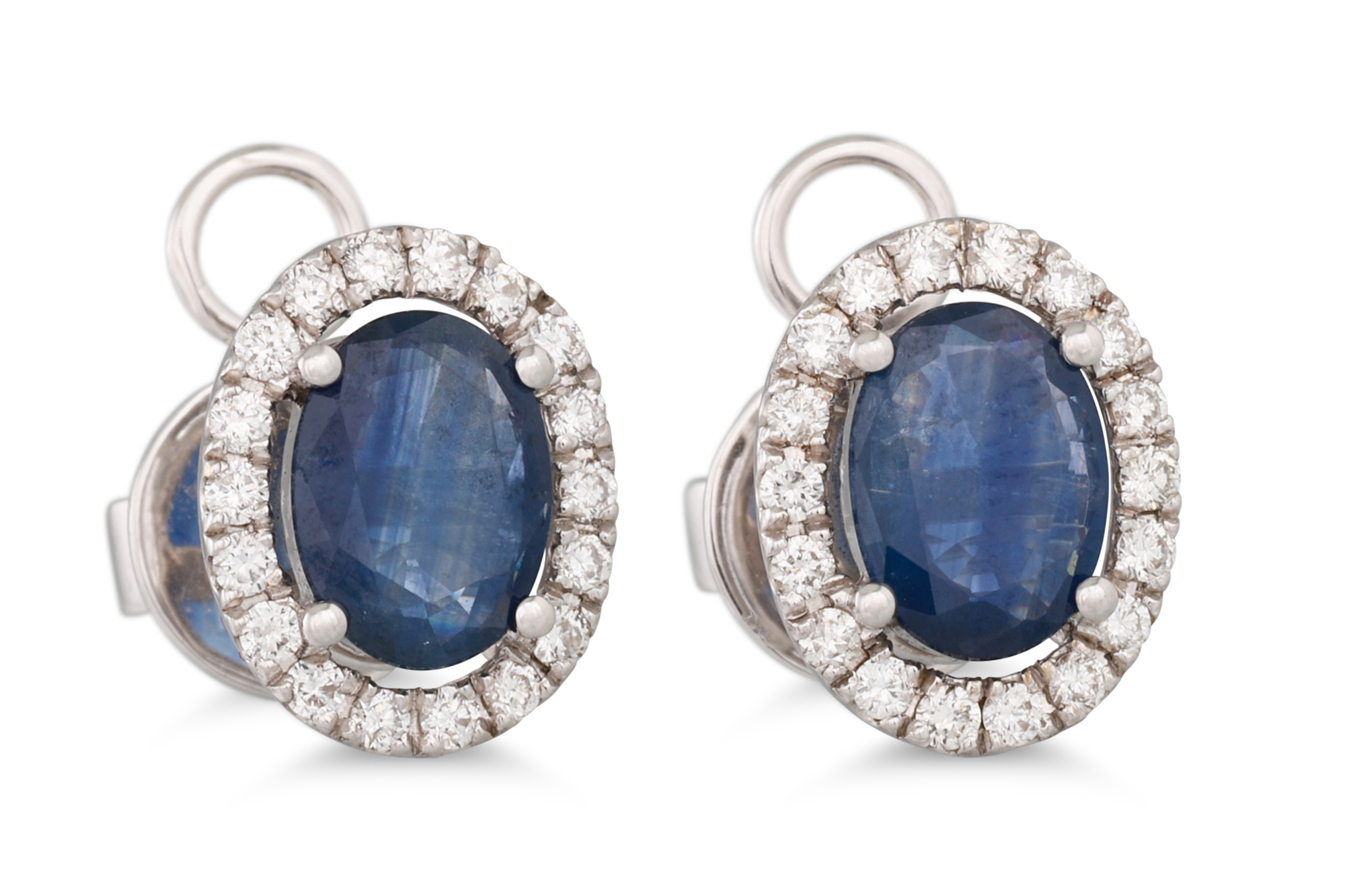 A PAIR OF SAPPHIRE AND DIAMOND CLUSTER EARRINGS, the oval sapphires to diamond surrounds, mounted in