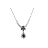 A SAPPHIRE AND DIAMOND CLUSTER DROP PENDANT, on a chain, mounted in 18ct white gold