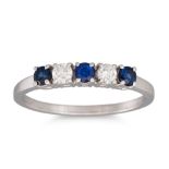 A SAPPHIRE AND DIAMOND FIVE STONE RING, mounted in 18ct white gold. Estimated: weight of diamonds: