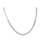 A DIAMOND SET NECKLACE, the brilliant cut diamonds mounted in 18ct white gold. Estimated: weight