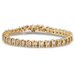 A DIAMOND SET BRACELET, in 10ct gold