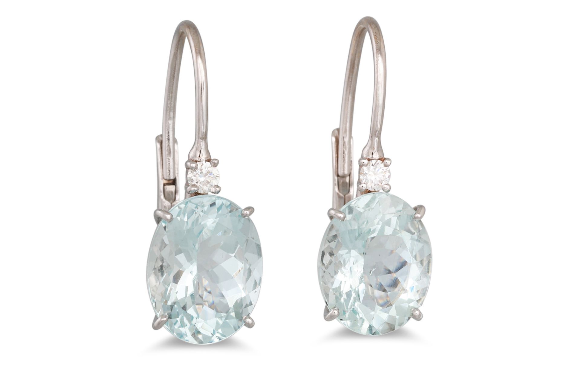 A PAIR OF AQUAMARINE AND DIAMOND EARRINGS, the oval aquamarines with brilliant cut diamonds, in 18ct